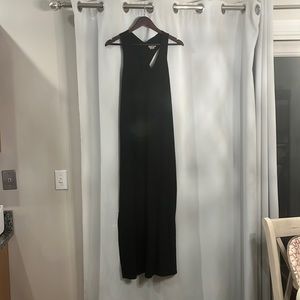Size medium black maxi dress, each side has a slit on the bottom